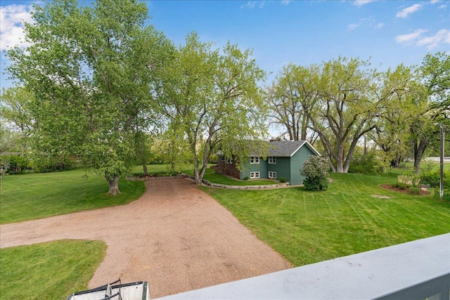 70 Dune Hill Ln, Great Falls, MT 59404 - view of property hidden behind natural elements featuring a front lawn