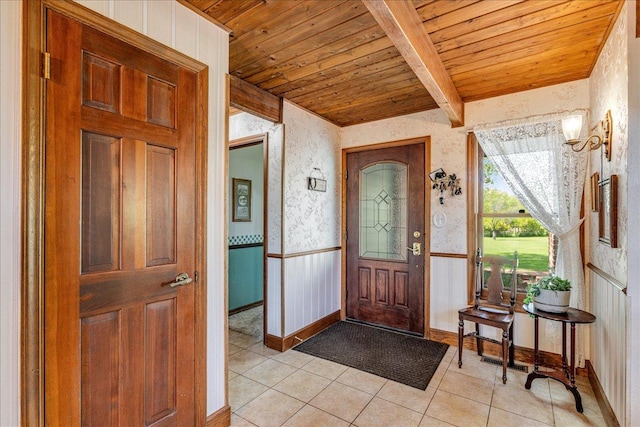 70 Dune Hill Ln, Great Falls, MT 59404 - entrance foyer with wood ceiling with exposed beams, light tile patterned floors, and baseboards