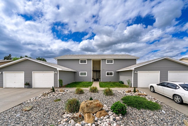 1380 Easy St, Billings, MT 59105 - view of front of property with an attached garage and concrete driveway