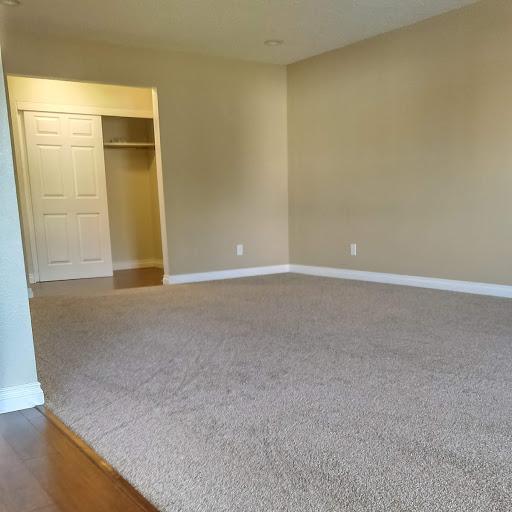 1380 Easy St, Billings, MT 59105 - unfurnished bedroom featuring baseboards, carpet, and a closet