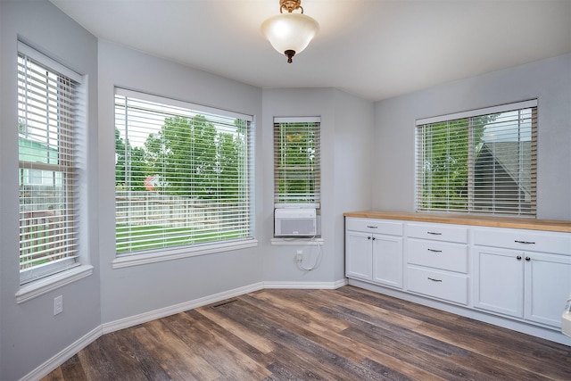 1605 Lund Ln, Polson, MT 59860 - unfurnished dining area with dark wood-style floors and baseboards