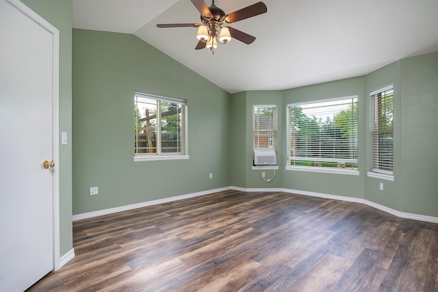 1605 Lund Ln, Polson, MT 59860 - empty room featuring wood finished floors, ceiling fan, vaulted ceiling, and baseboards