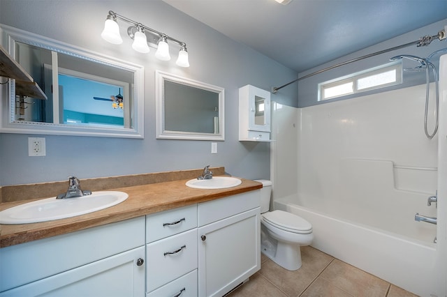1605 Lund Ln, Polson, MT 59860 - full bath with tile patterned floors, toilet, shower / washtub combination, and double vanity