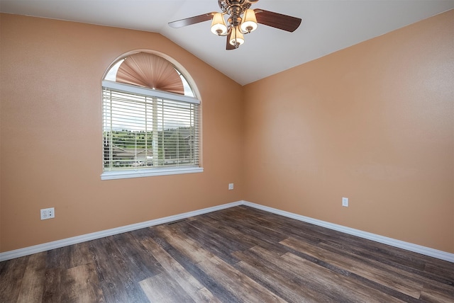 1605 Lund Ln, Polson, MT 59860 - unfurnished room featuring ceiling fan, vaulted ceiling, dark wood-style floors, and baseboards