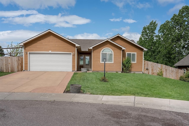 1605 Lund Ln, Polson, MT 59860 - ranch-style home featuring a garage and driveway