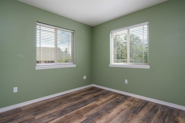 1605 Lund Ln, Polson, MT 59860 - spare room with dark wood-style floors and baseboards