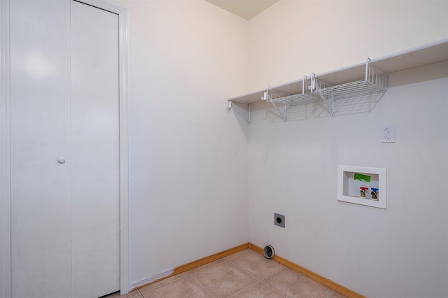 1605 Lund Ln, Polson, MT 59860 - laundry room featuring hookup for an electric dryer, washer hookup, baseboards, and light tile patterned flooring