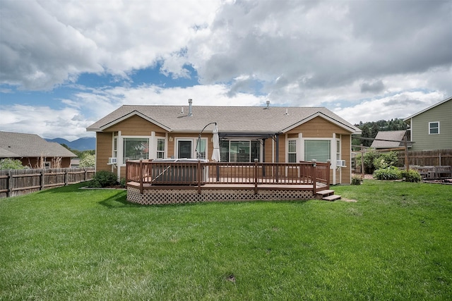 1605 Lund Ln, Polson, MT 59860 - rear view of property featuring a deck and roof with shingles