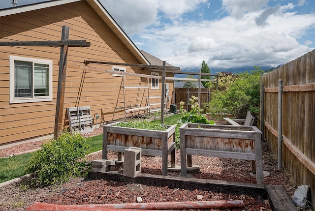 1605 Lund Ln, Polson, MT 59860 - fenced backyard with a garden
