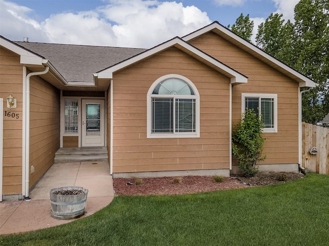 1605 Lund Ln, Polson, MT 59860 - view of home's exterior featuring roof with shingles