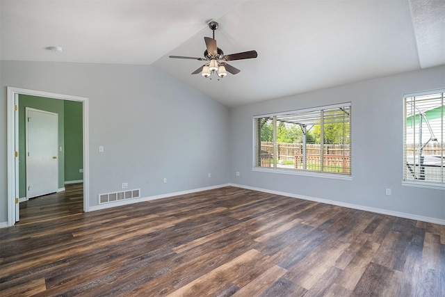 1605 Lund Ln, Polson, MT 59860 - empty room with vaulted ceiling, dark wood-style floors, ceiling fan, baseboards, and a smoke detector