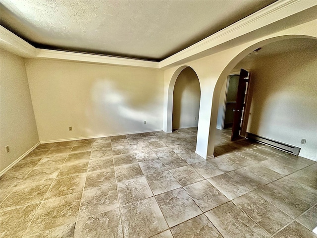 310 W Armitage St, Ennis, MT 59729 - unfurnished room with baseboard heating, a raised ceiling, arched walkways, a textured ceiling, and baseboards