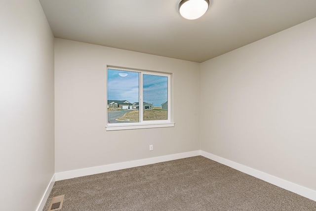 249 Stirling Loop, East Helena, MT 59635 - empty room with dark carpet and baseboards
