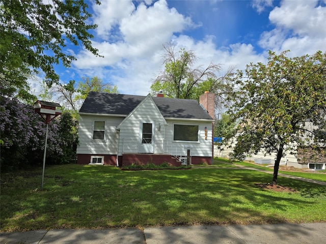 3421 4th Ave N, Great Falls, MT 59401 - view of front of house featuring a front lawn and a chimney