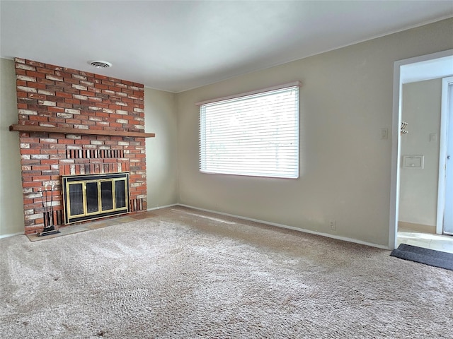 3421 4th Ave N, Great Falls, MT 59401 - unfurnished living room with carpet floors, baseboards, and a brick fireplace