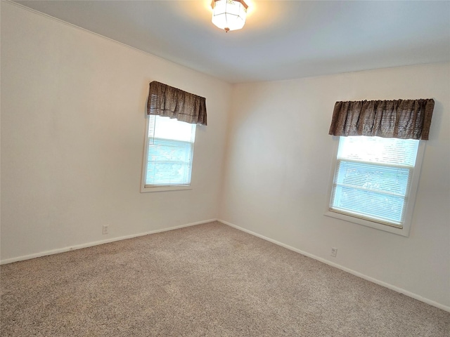 3421 4th Ave N, Great Falls, MT 59401 - carpeted spare room featuring baseboards