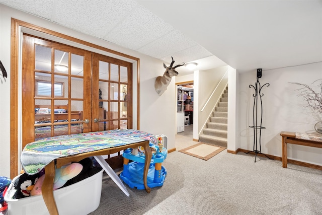 150 Painted Mdws, Butte, MT 59701 - dining room featuring carpet floors, baseboards, stairway, and french doors