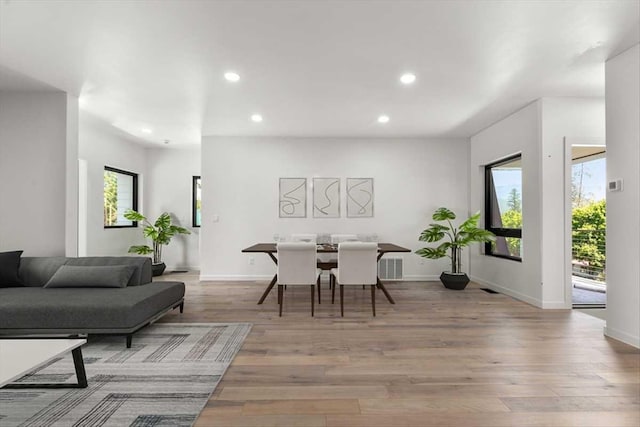 713 W 2nd St W, Whitefish, MT 59937 - dining space with recessed lighting, light wood-style floors, and baseboards