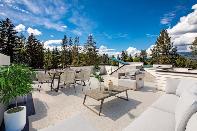 713 W 2nd St W, Whitefish, MT 59937 - view of patio / terrace featuring outdoor dining space
