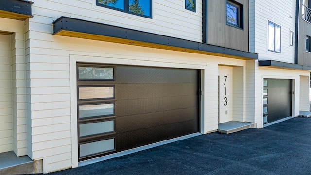713 W 2nd St W, Whitefish, MT 59937 - garage with asphalt driveway