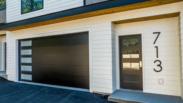 713 W 2nd St W, Whitefish, MT 59937 - property entrance featuring a garage