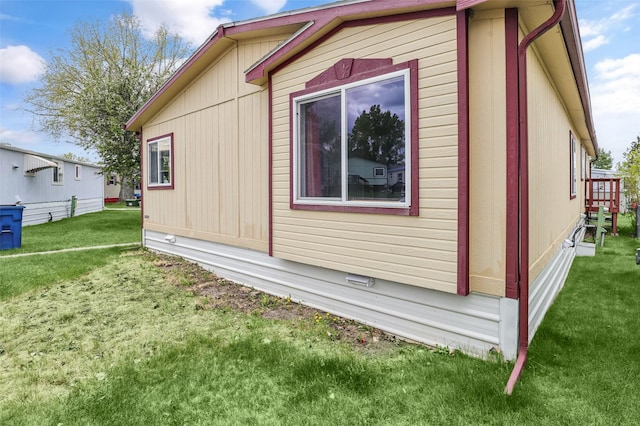 3805 7th St NE Unit 107, Great Falls, MT 59404 - view of property exterior featuring a yard