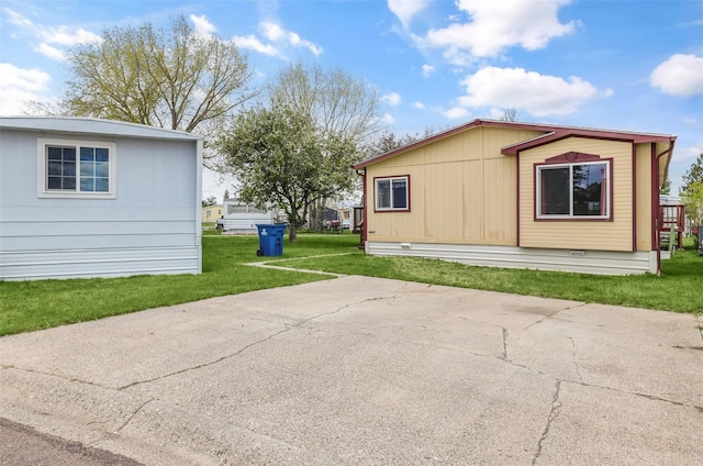 3805 7th St NE Unit 107, Great Falls, MT 59404 - view of side of property with a lawn