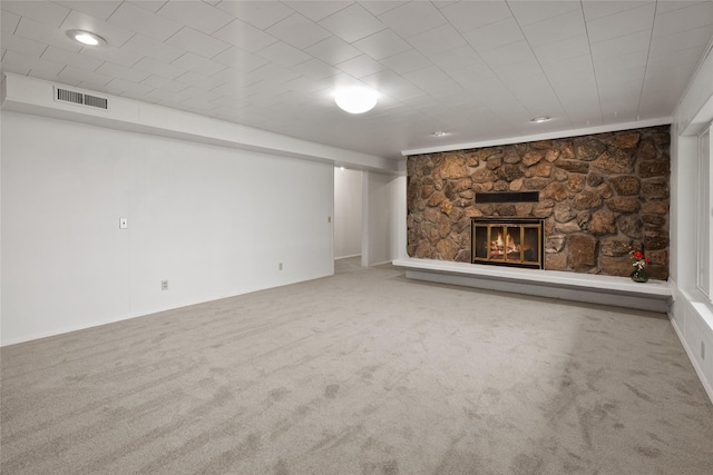 38941 Baypoint Ln, Polson, MT 59860 - unfurnished living room featuring carpet flooring, a fireplace, and baseboards