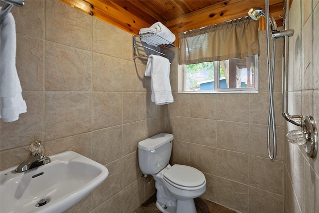 38941 Baypoint Ln, Polson, MT 59860 - bathroom with a sink, wooden ceiling, toilet, and tiled shower