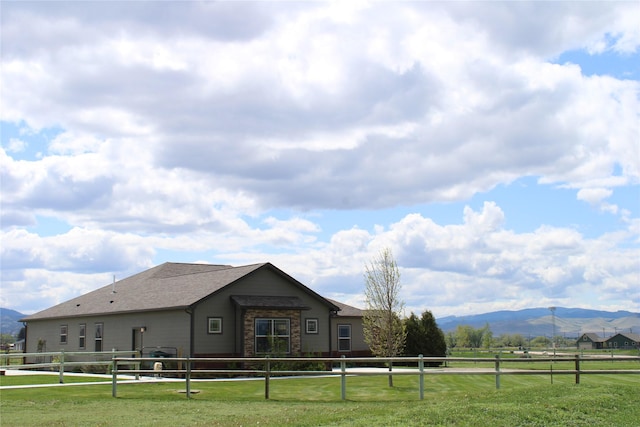 2567 Reardon Rd, Helena, MT 59602 - rear view of house with a mountain view