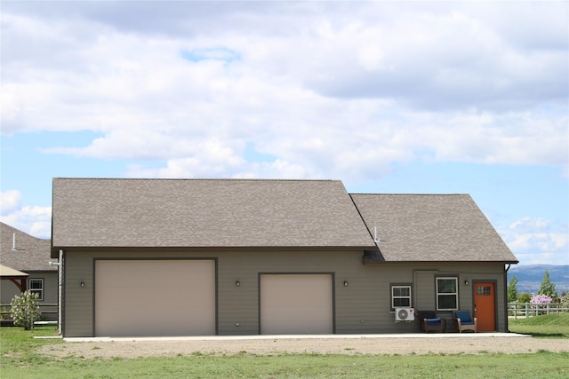 2567 Reardon Rd, Helena, MT 59602 - view of front of house with a garage and roof with shingles