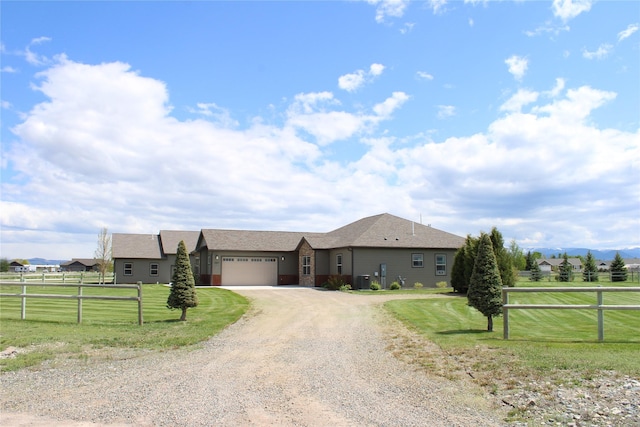 2567 Reardon Rd, Helena, MT 59602 - ranch-style home with driveway and a garage