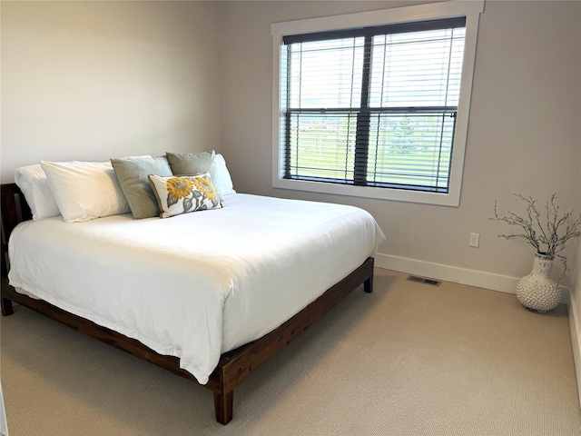 2567 Reardon Rd, Helena, MT 59602 - bedroom featuring light colored carpet and baseboards