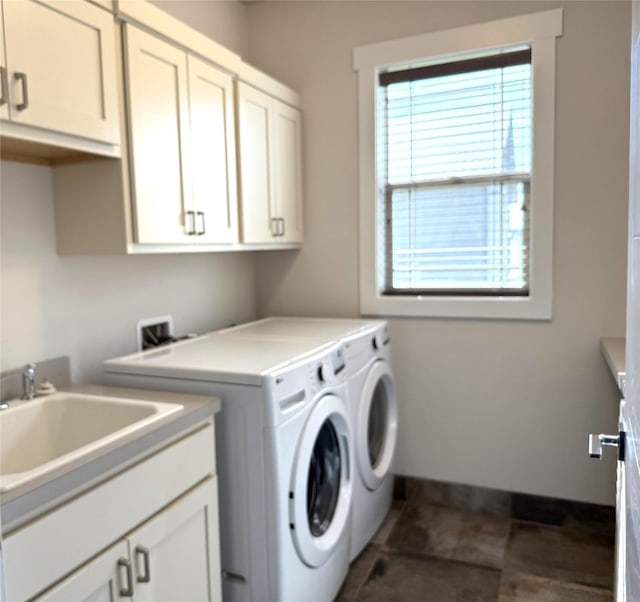 2567 Reardon Rd, Helena, MT 59602 - laundry room featuring cabinet space, washing machine and dryer, and baseboards