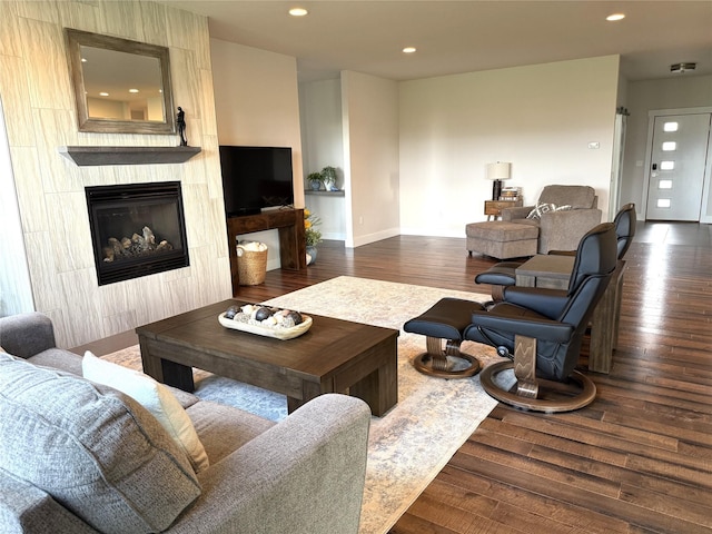 2567 Reardon Rd, Helena, MT 59602 - living room featuring wood finished floors, a fireplace, baseboards, and recessed lighting
