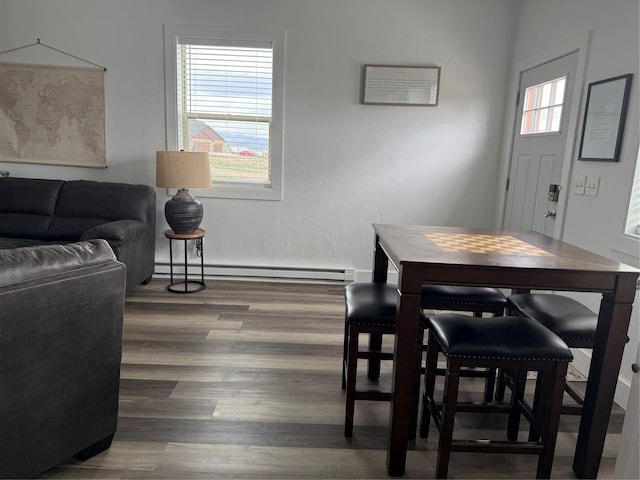 2567 Reardon Rd, Helena, MT 59602 - dining space with a baseboard radiator and wood finished floors
