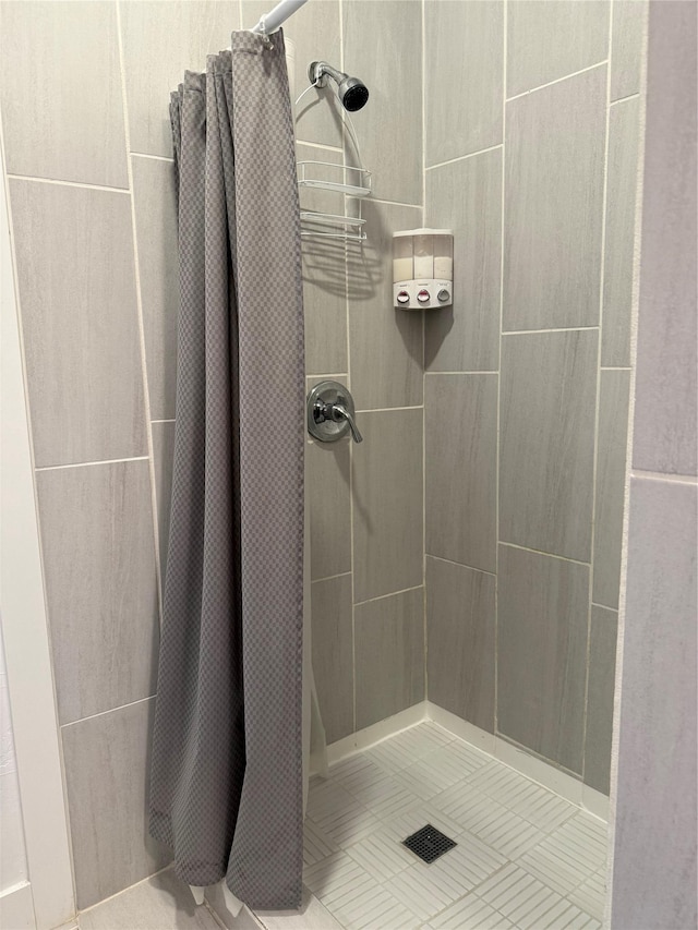 2567 Reardon Rd, Helena, MT 59602 - bathroom featuring a shower stall and tile patterned flooring