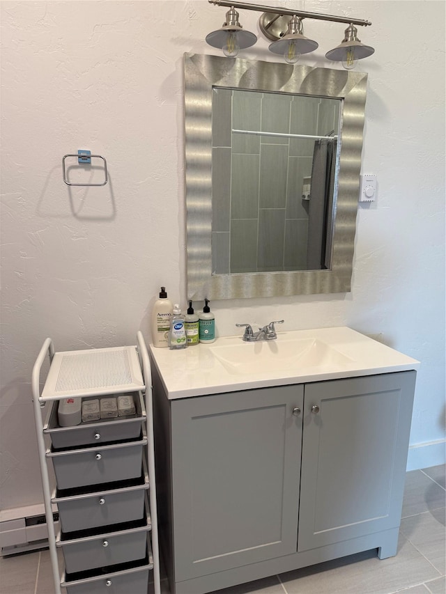 2567 Reardon Rd, Helena, MT 59602 - bathroom featuring vanity, tile patterned floors, and baseboards