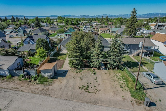 211 W Main St, East Helena, MT 59635 - aerial perspective of suburban area featuring a mountainous background