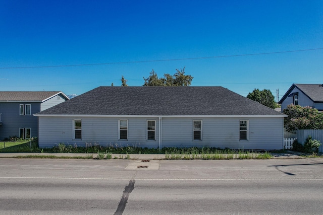 211 W Main St, East Helena, MT 59635 - view of front facade featuring a shingled roof