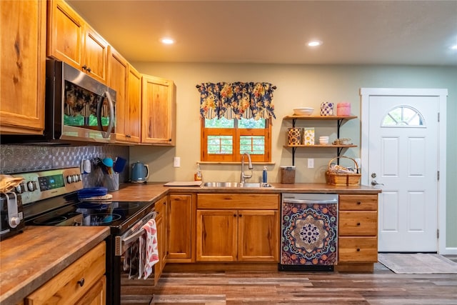 1118 Dakota Ave, Libby, MT 59923 - kitchen featuring stainless steel appliances, a sink, dark wood-style flooring, recessed lighting, and open shelves
