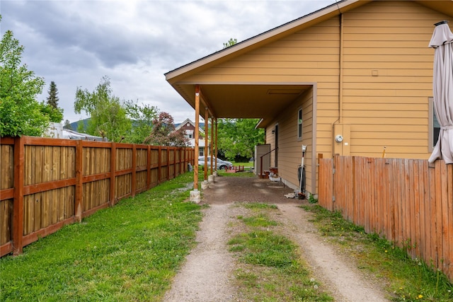 1118 Dakota Ave, Libby, MT 59923 - view of side of property with driveway