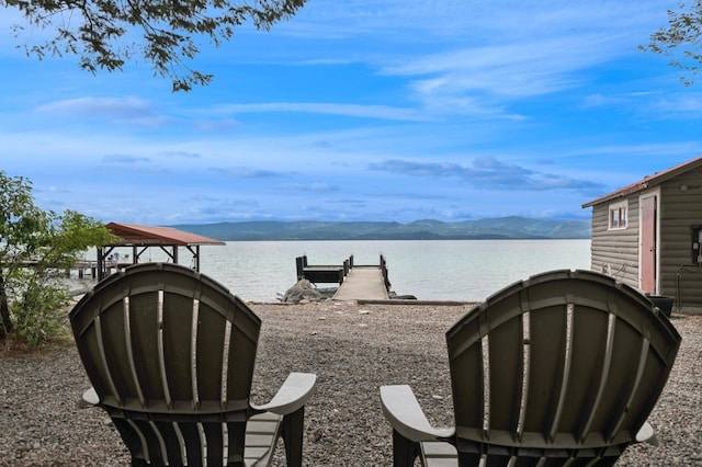 33604 Whitecap Ln, Bigfork, MT 59911 - water view with a mountainous background and a boat dock