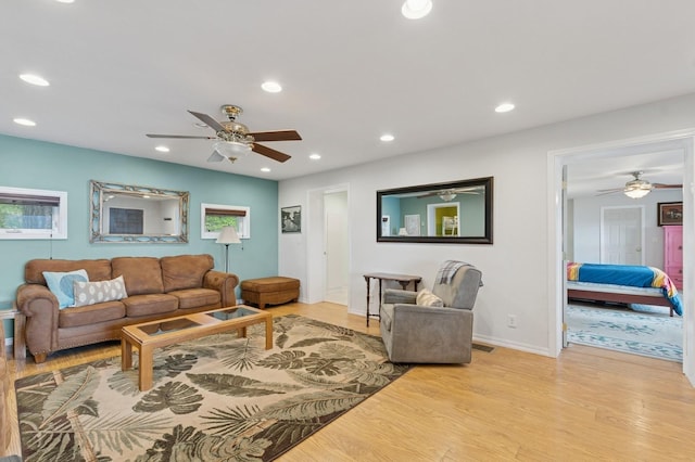 33604 Whitecap Ln, Bigfork, MT 59911 - living area with light wood-style flooring, a ceiling fan, recessed lighting, and baseboards