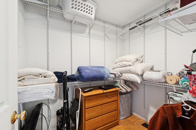 33604 Whitecap Ln, Bigfork, MT 59911 - walk in closet with wood finished floors