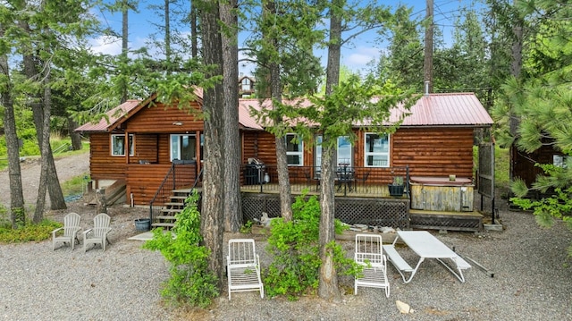 33604 Whitecap Ln, Bigfork, MT 59911 - rear view of property featuring metal roof and stairs