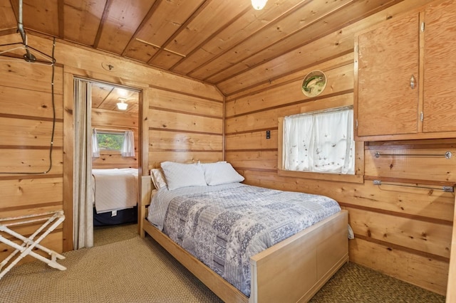 33604 Whitecap Ln, Bigfork, MT 59911 - carpeted bedroom with wooden walls and wood ceiling