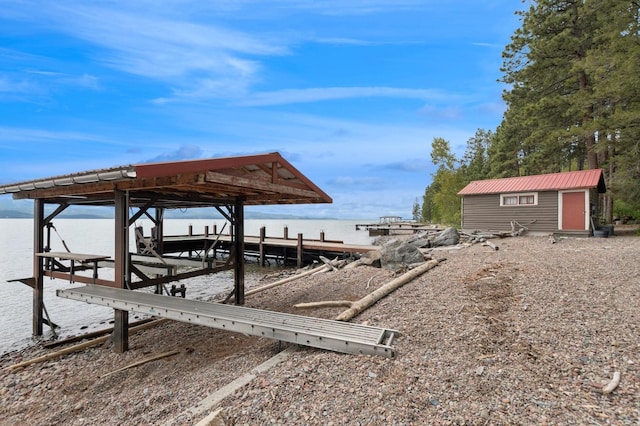 33604 Whitecap Ln, Bigfork, MT 59911 - dock featuring a water view and boat lift