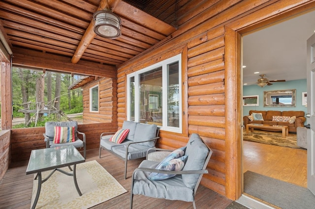 33604 Whitecap Ln, Bigfork, MT 59911 - wooden deck featuring an outdoor hangout area