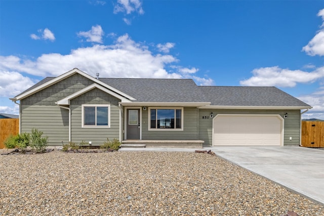 850 Pollux Rd, Helena, MT 59602 - ranch-style home with driveway, an attached garage, and a shingled roof